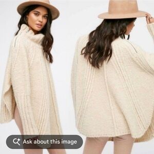 Free People Spin Around Cream Oversized Poncho Sweater.